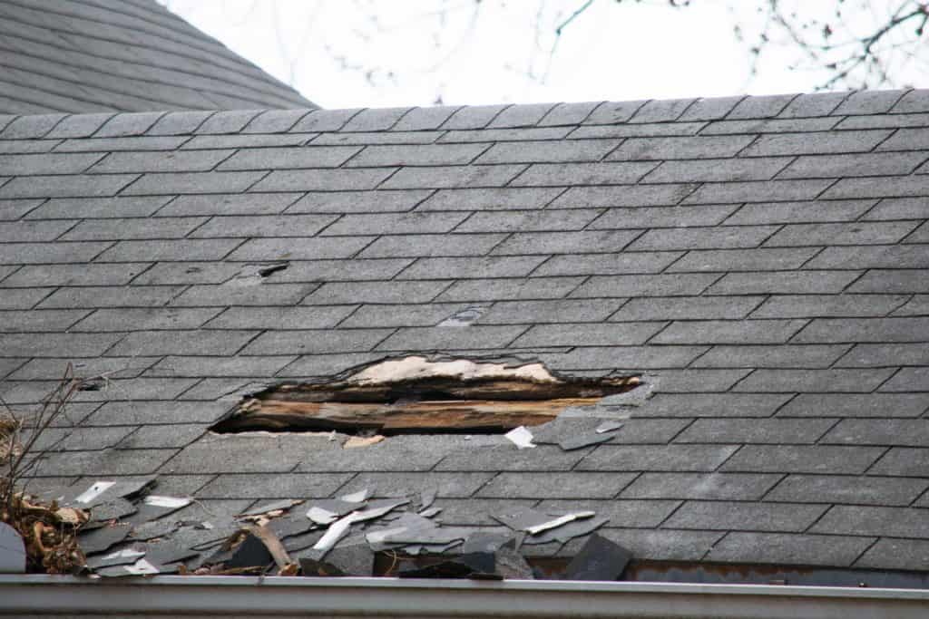 A huge hole on the roof due to damage focused water absorption