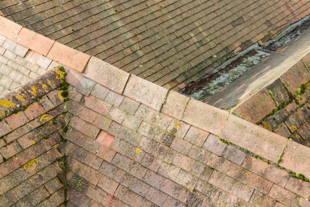 Aerial view of pitched tiled roof (rooves) on old English houses
