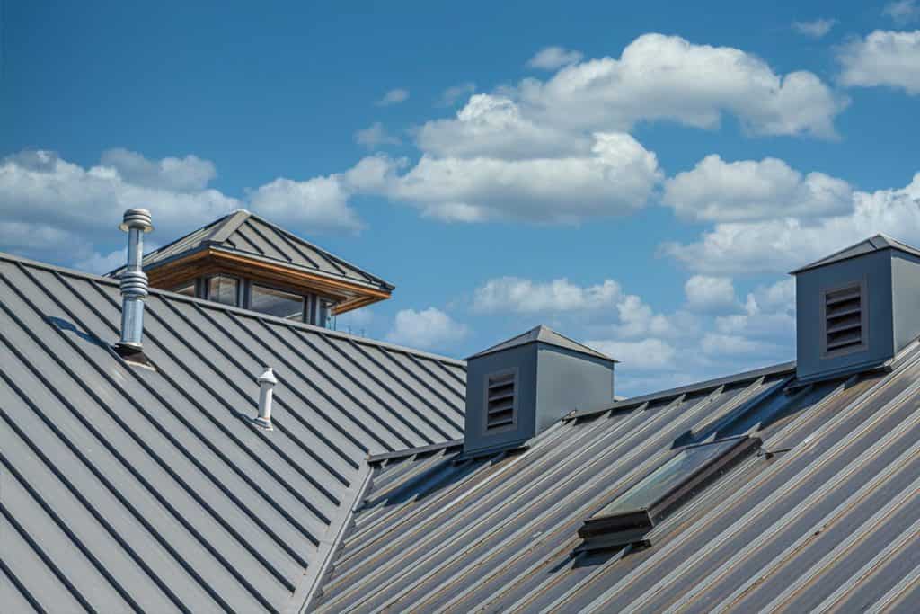 Metal roof under blue sky