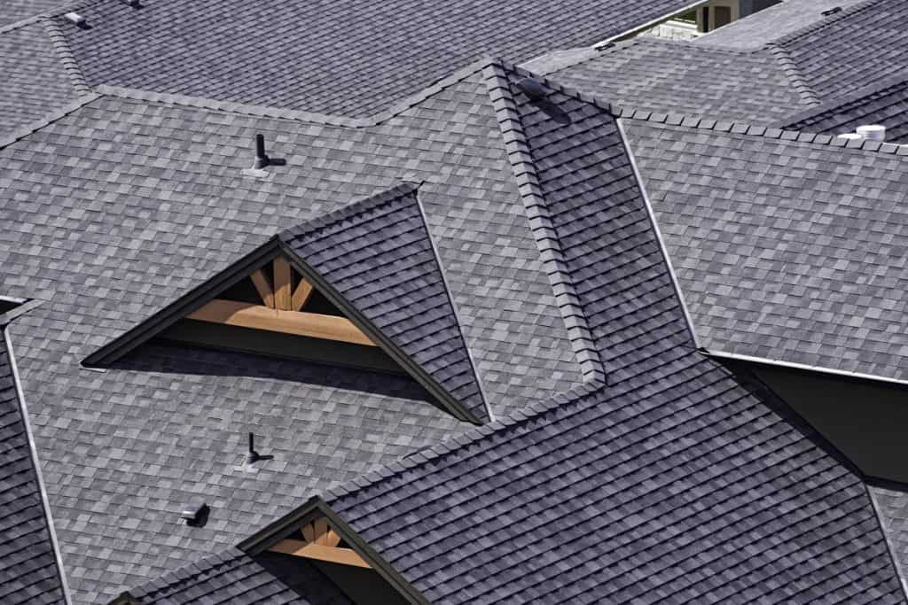 Rooftop in a newly constructed subdivision showing asphalt shingles