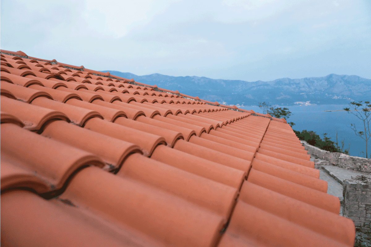 red clay roof shingles close up photo