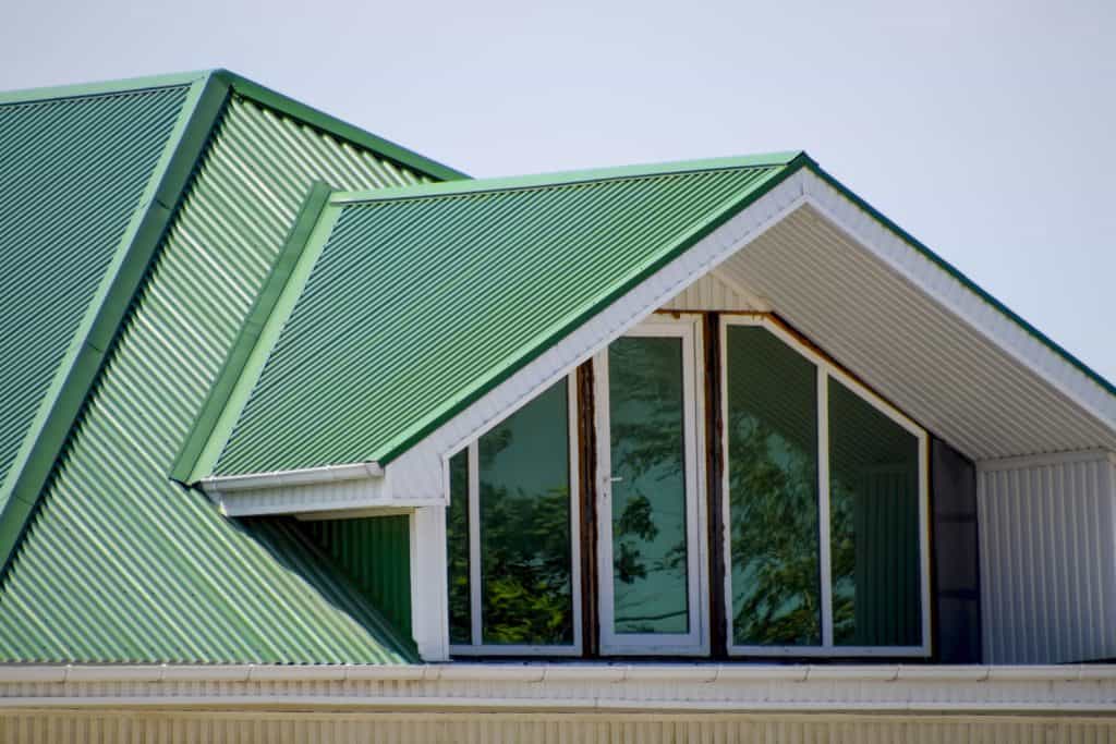 A long green metal roofing at a pitched roof     