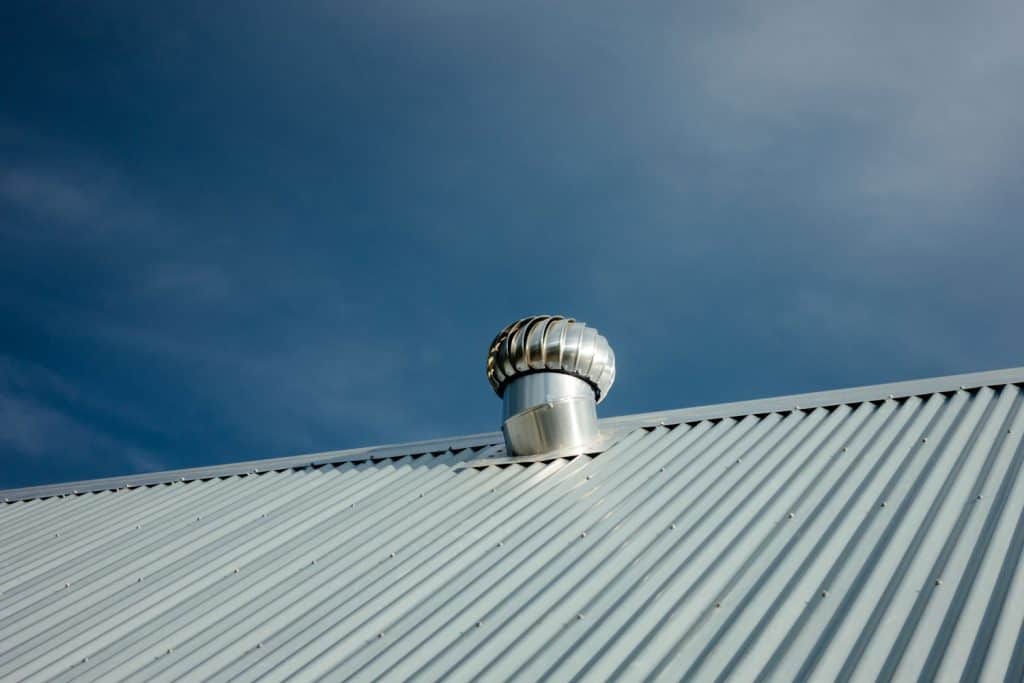 A stainless residential type exhaust vent of the roof