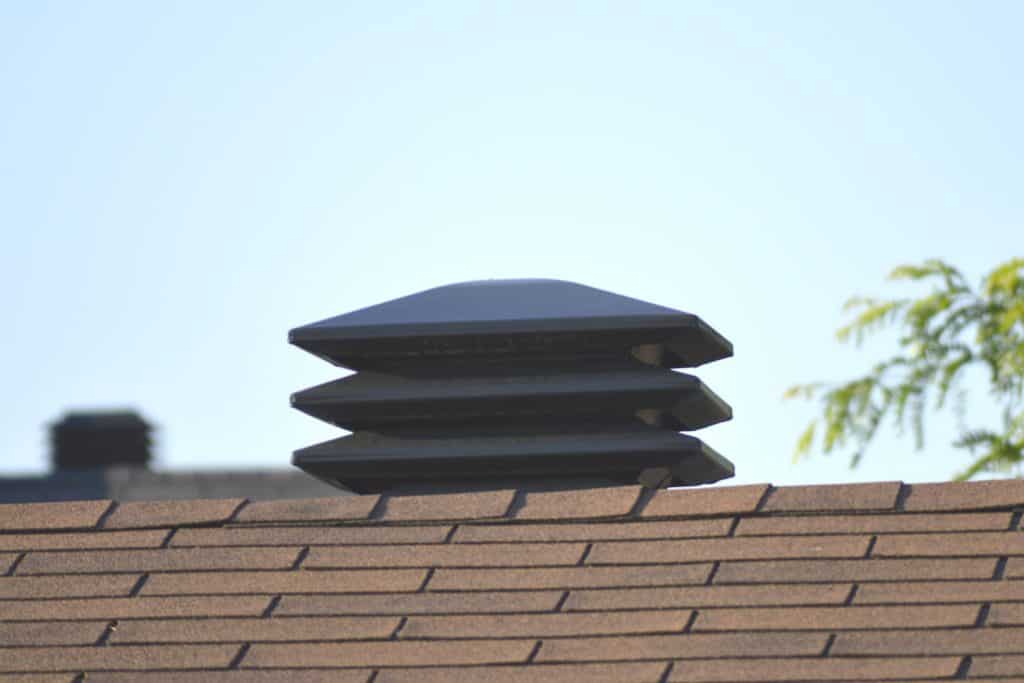 A three way vent of an asphalt shingle roof