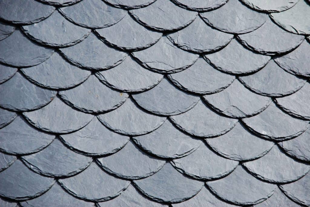 Arched slate tile roofing material