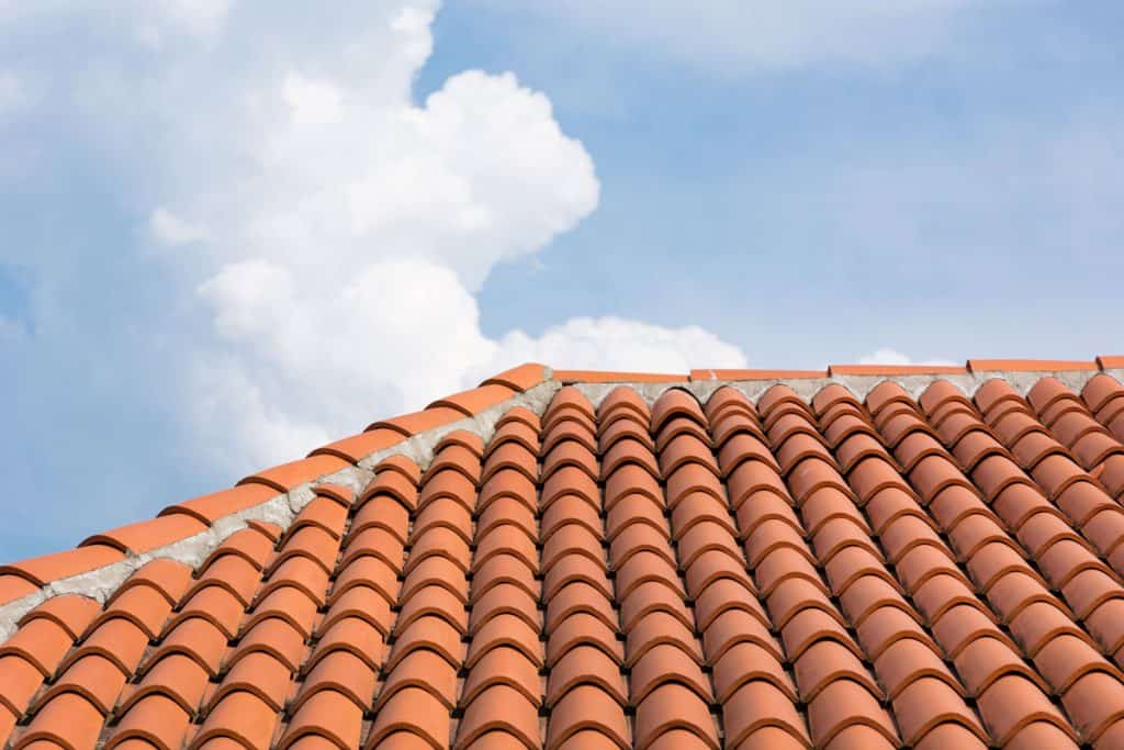 Beautiful and new orange roof tile pattern on modern house