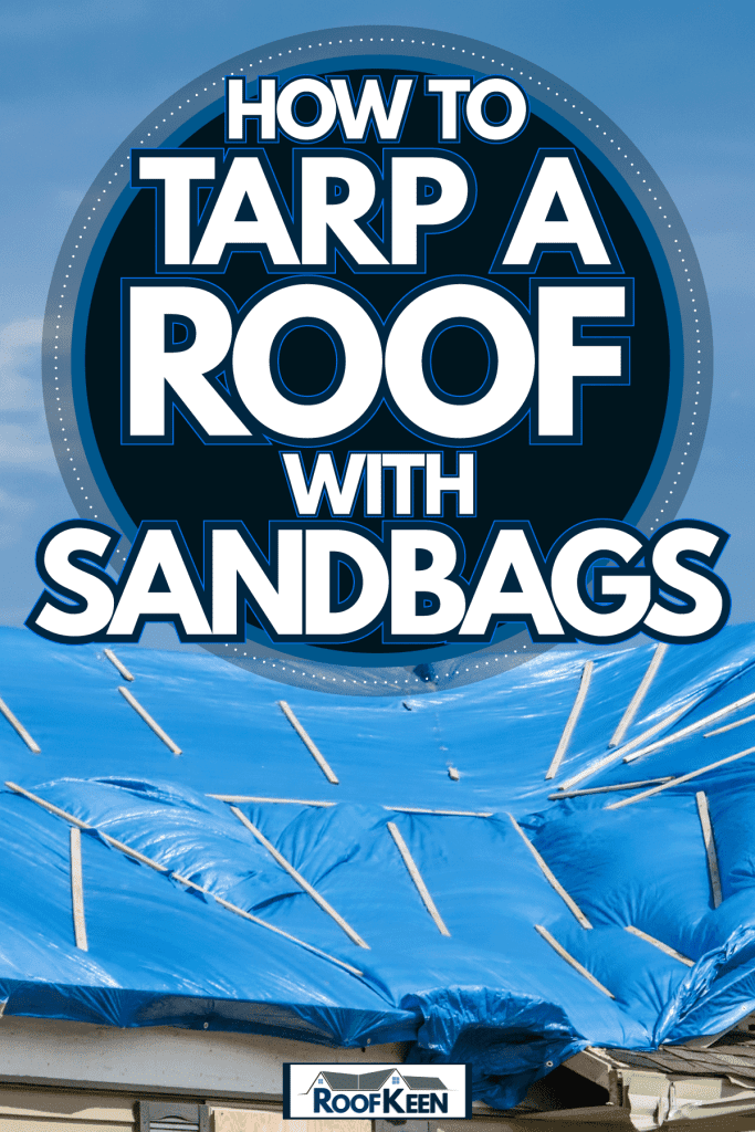 A blue colored tarp laid on the roof of a two story house, How To Tarp A Roof With Sandbags