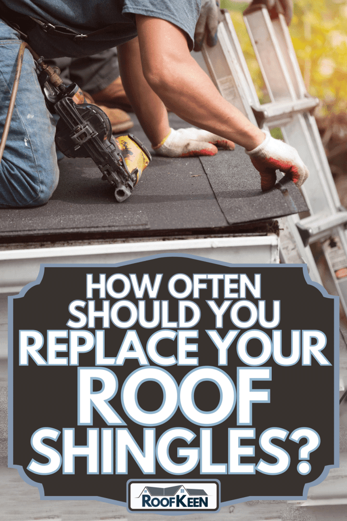 Roofers installing a new roof on residential home, How often should you replace your roof shingles?