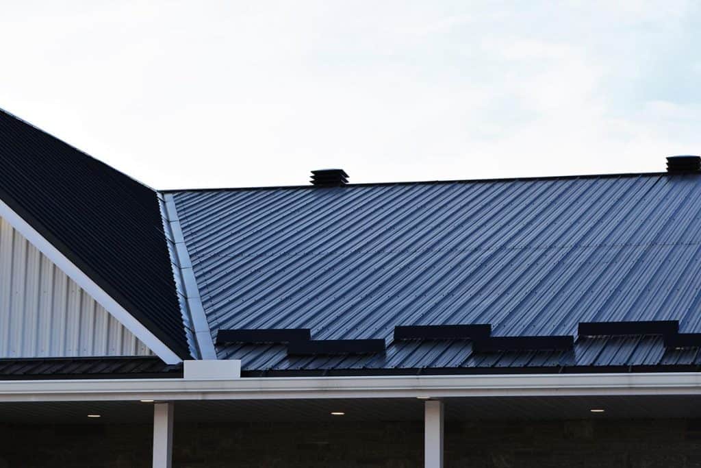 Newly installed metal roof showing vents