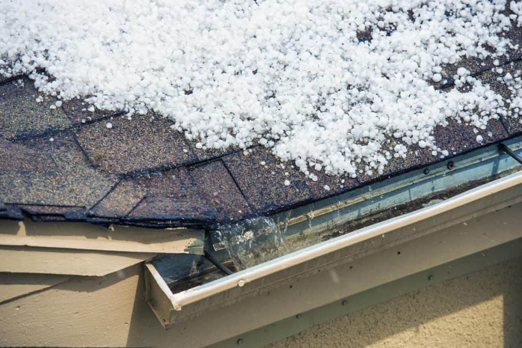 Small melting hail on the roof