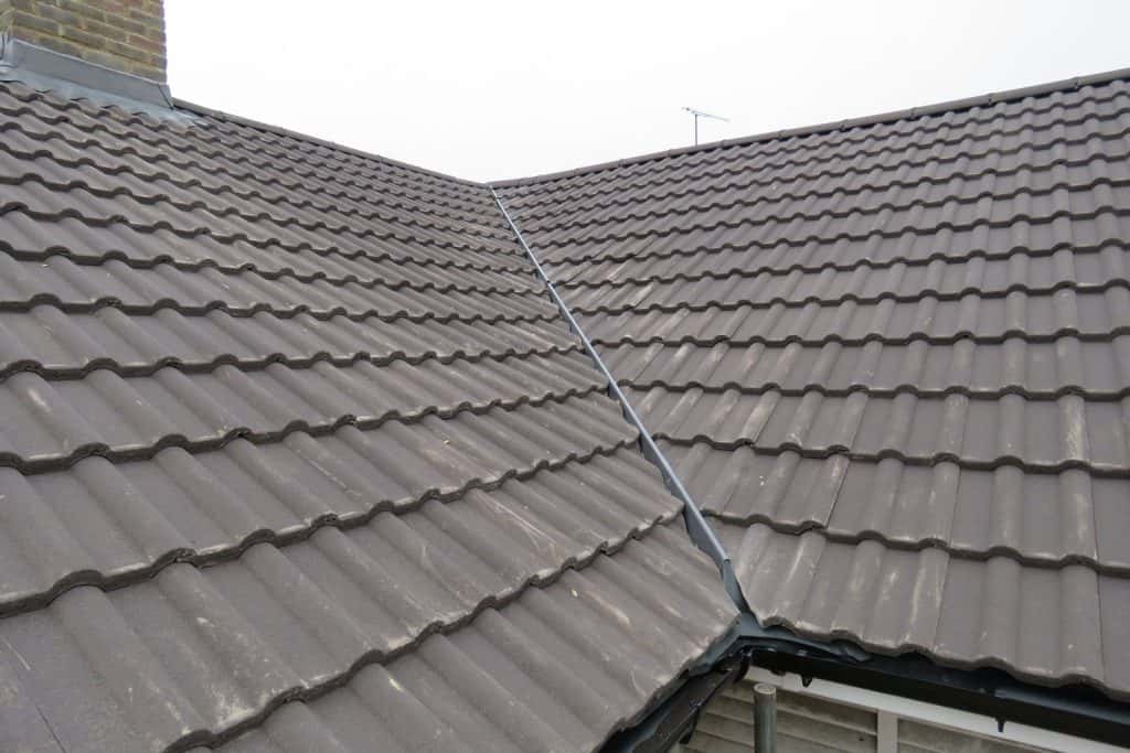 Valley flashing on a clay tile roofing of a house