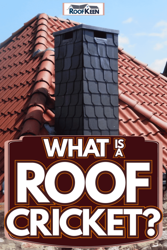 A high pitch roof with metal roofing and a chimney with decorative stone cladding, What Is A Roof Cricket?