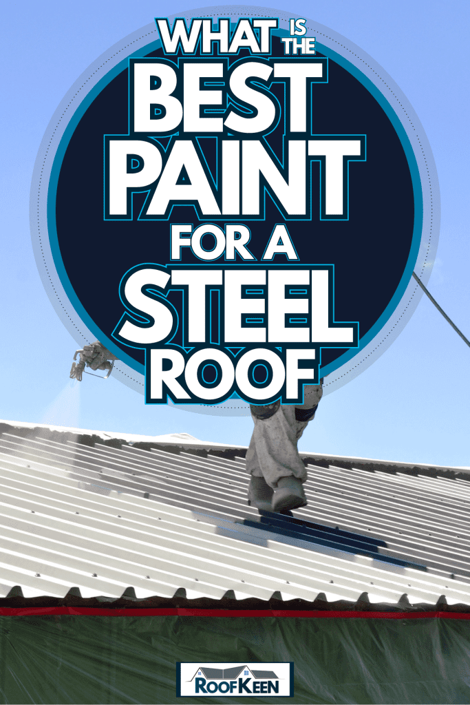 A worker painting the roof of a small house, What Is The Best Paint For a Steel Roof