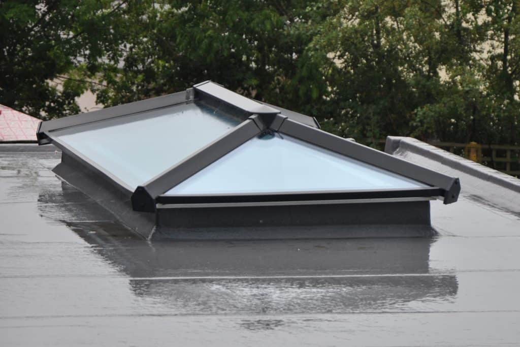 Grey flat roof window or light / lantern.